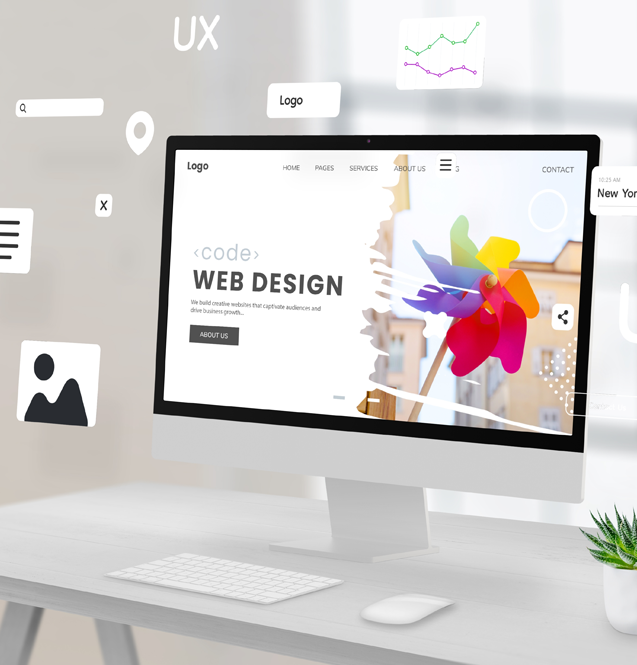 Desktop computer displaying a colorful web design homepage with a pinwheel illustration.